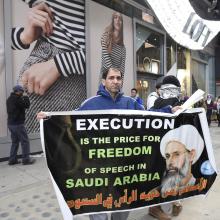 NEW YORK CITY - JANUARY 17 2016: Hundreds gathered in Times Square to protest the Saudi government’s execution of dissident sheikh Nimr Baqir al-Nimr and demand the release of Sheikh Ibrahim Zakzaky. © a katz, licensed under Shutterstock.